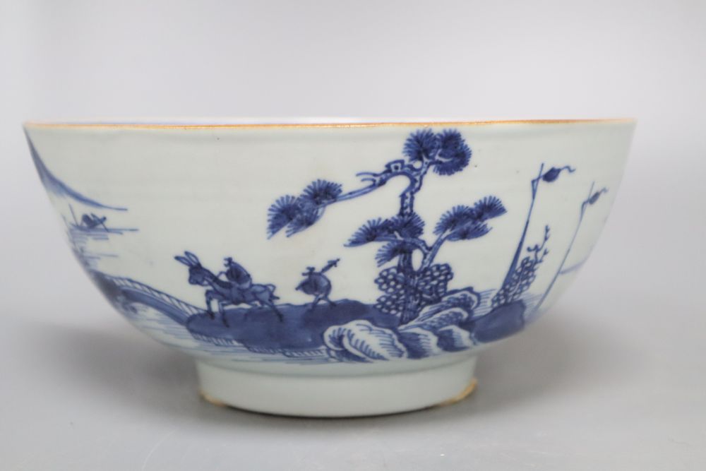 A Chinese blue and white bowl, a famille rose bowl and a famille verte saucer, largest diameter 20cm